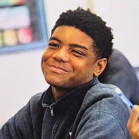 A Kolbe student smiling in class