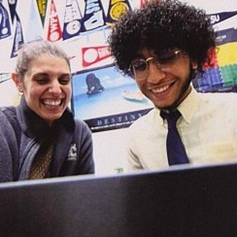 A Kolbe teacher and student working together at a laptop